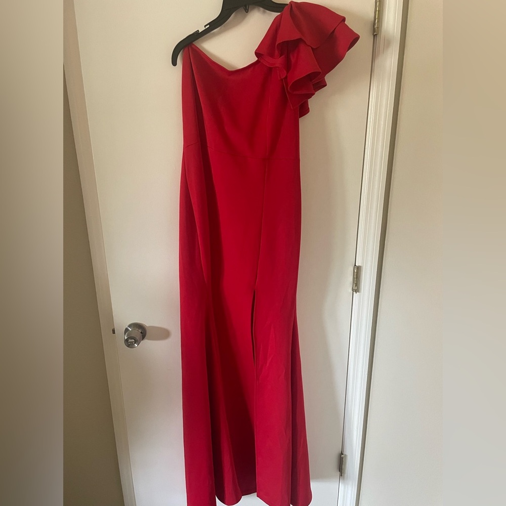 One sleeved formal red with a slit dress